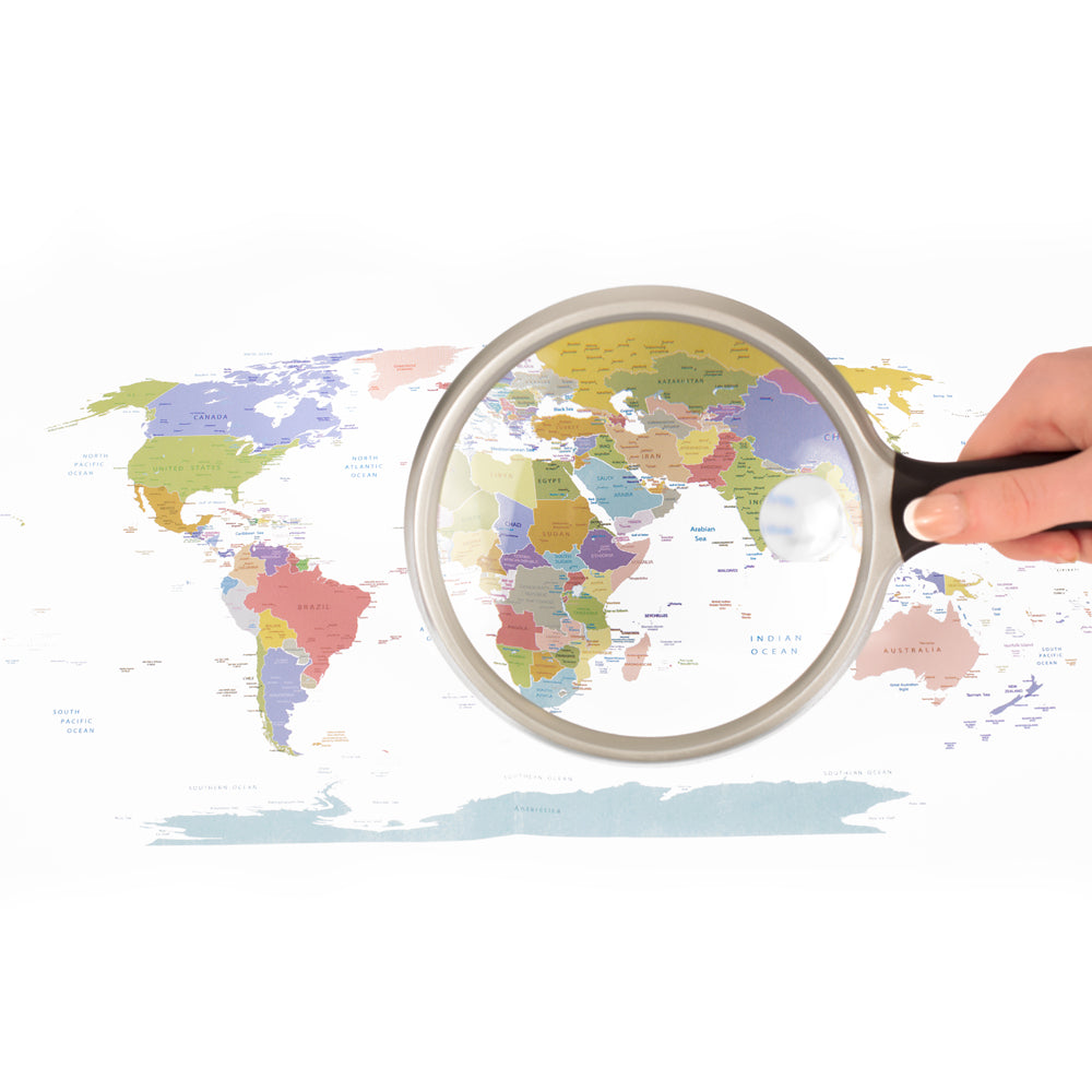 Hold the magnifying glass over the map to enlarge the details. This allows for better visibility of small text and intricate details. Ideal for planning routes or studying geographical features.